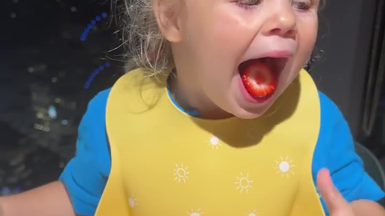 Funny Kids eating! Children are eating tasty strawberry