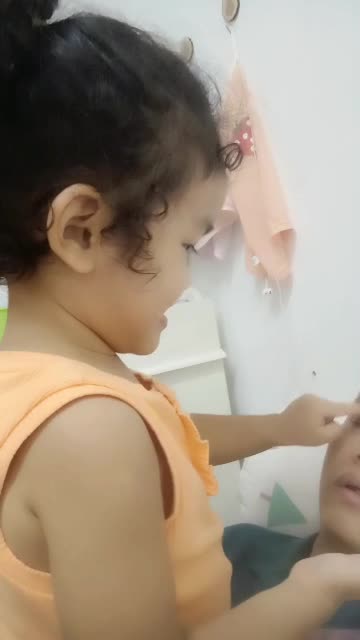 Esther Doing Daddy Facial Treatment