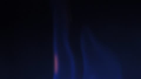 Blue fire in dark background
