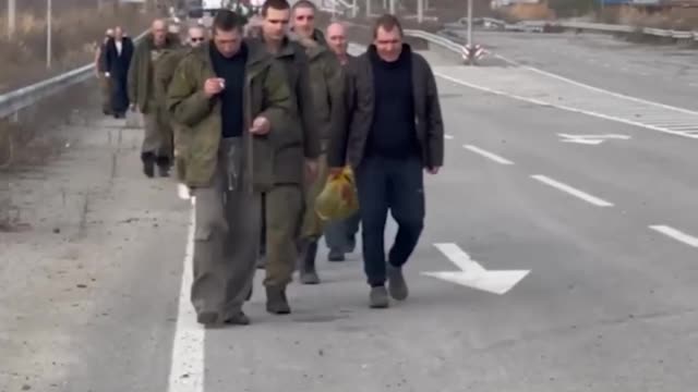 Footage shows released Russian-allied soldiers returning home.