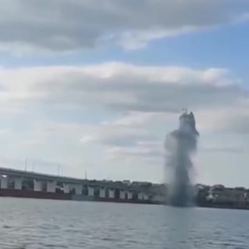 HIMARS multiple rocket launcher systems strike water near Antonovsky Bridge.