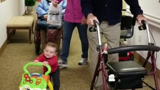 Baby and Great Grandfather Using Walkers Side by Side