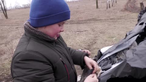 Ukrainian students build classroom on only hill with signal