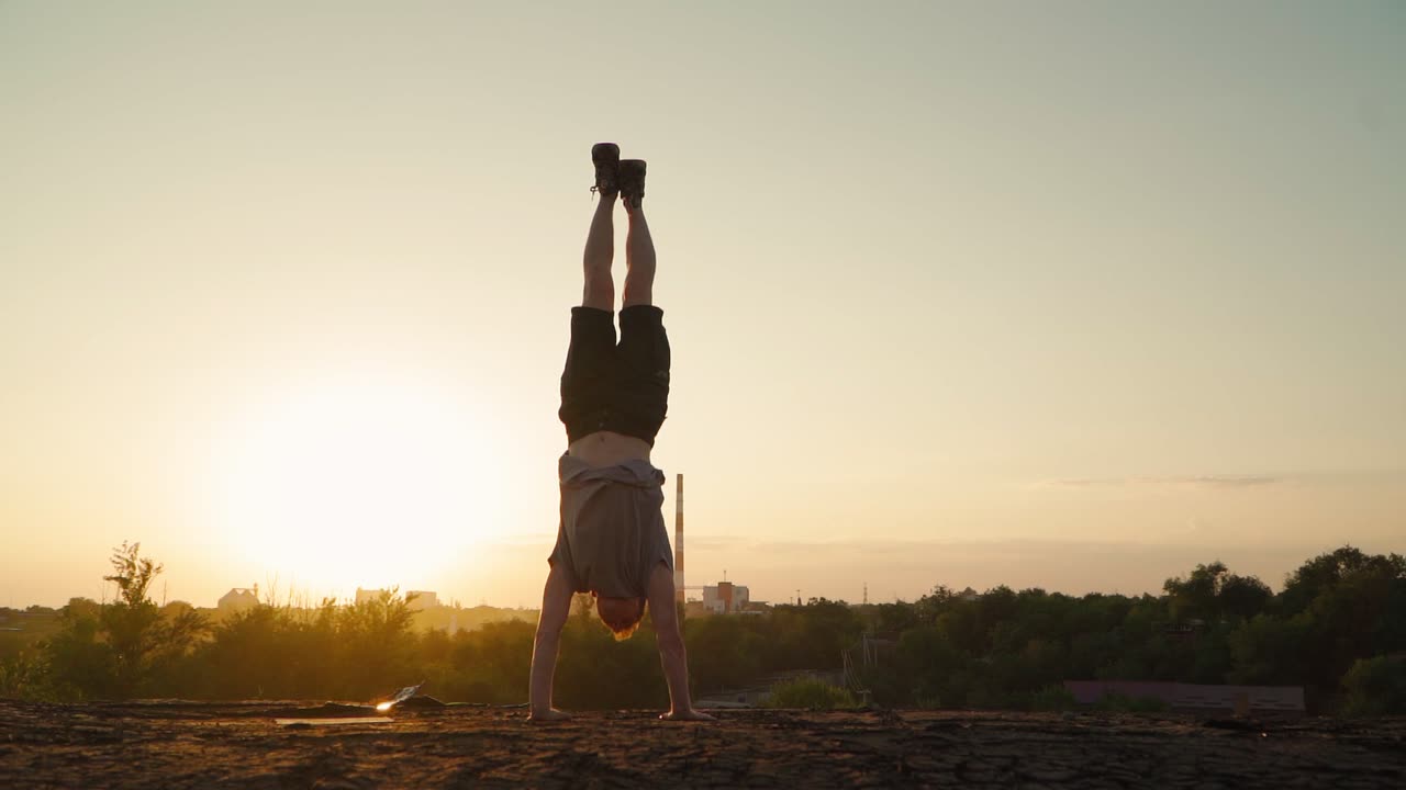 Sunset Handstand: Defying Gravity with Style and Spirit