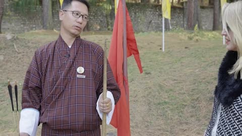 Marcia Learns to Use Bow and Arrow in Bhutan