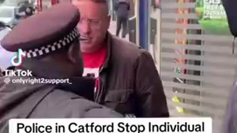 Police in Catford UK stop man for covering his face against facial recognition cameras