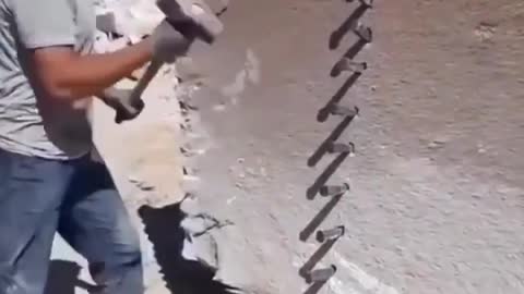 TEARING APART A BIG ROCK