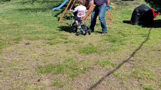 Paw Paw Teaching Half Pint to ride his bike