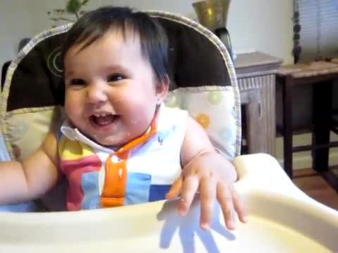 Adorable baby cracking up