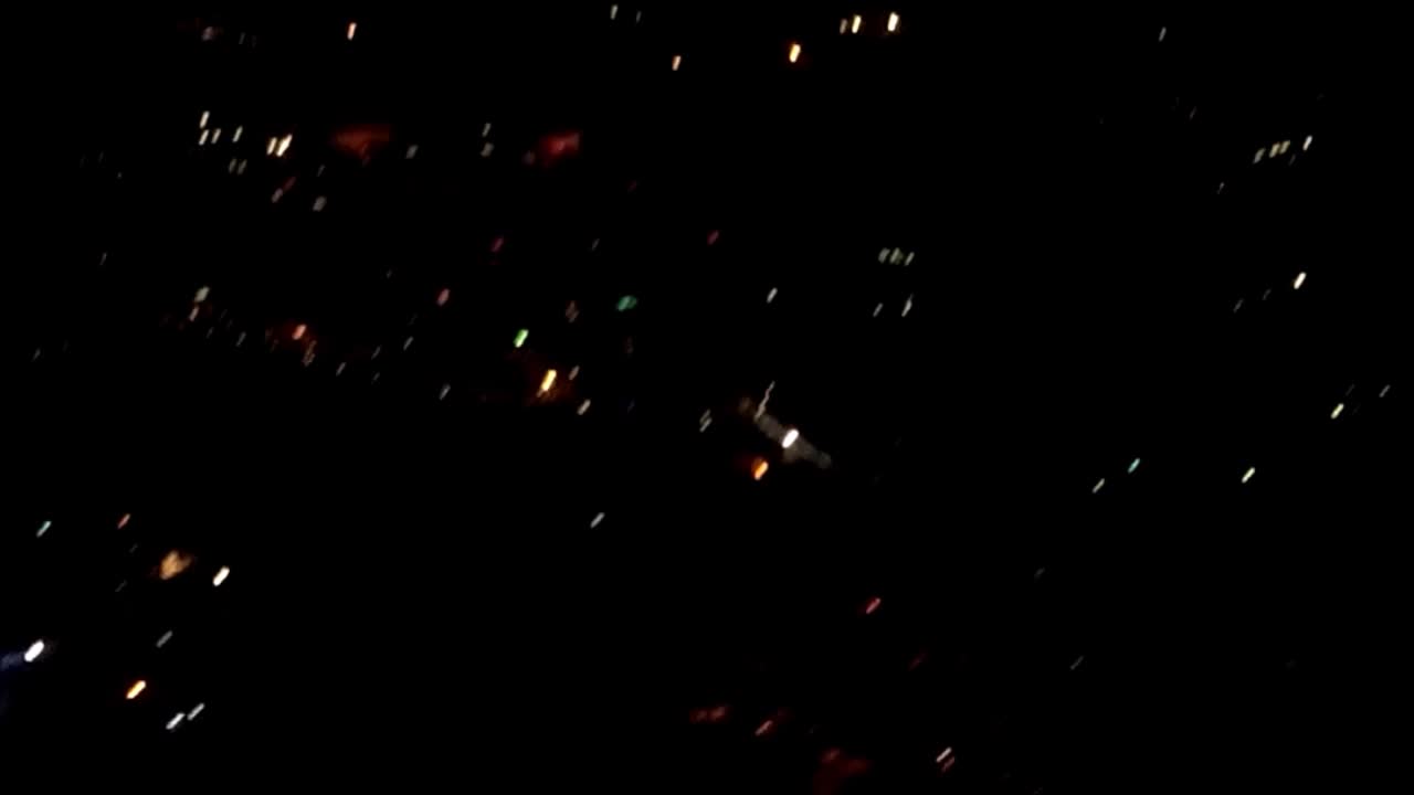 Cool firework display filmed from landing airplane