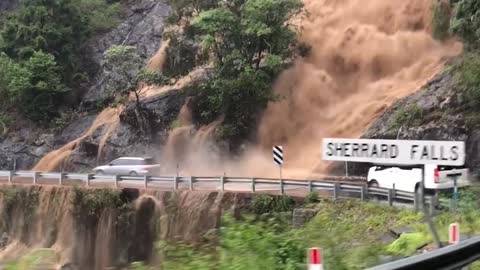 Flooding Waterfall Threatens Bridge