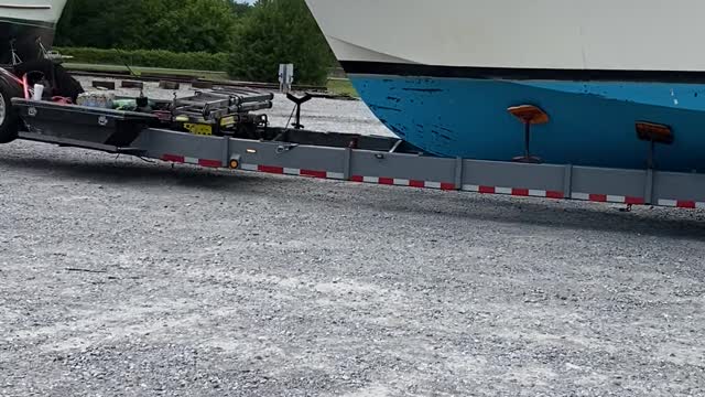 Truck Transporting Giant Boat