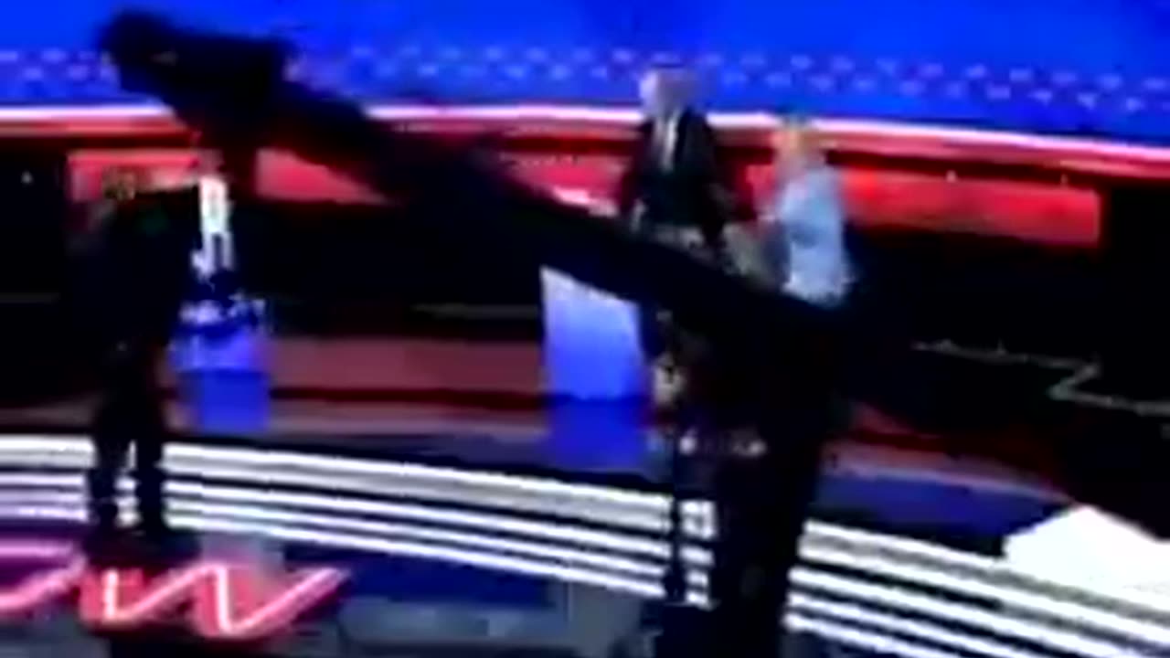 First Lady Jill Biden Guides Her Husband Off The Debate Stage