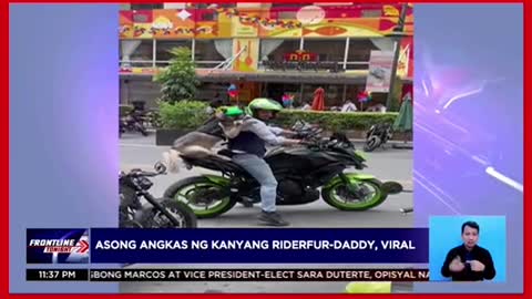 Asong angkas sa motor,agaw-pansinAsong angkas sa motor,agaw-pansin