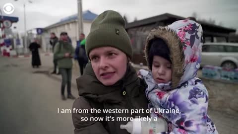 Women and children leave Ukraine as men stay behind to defend it