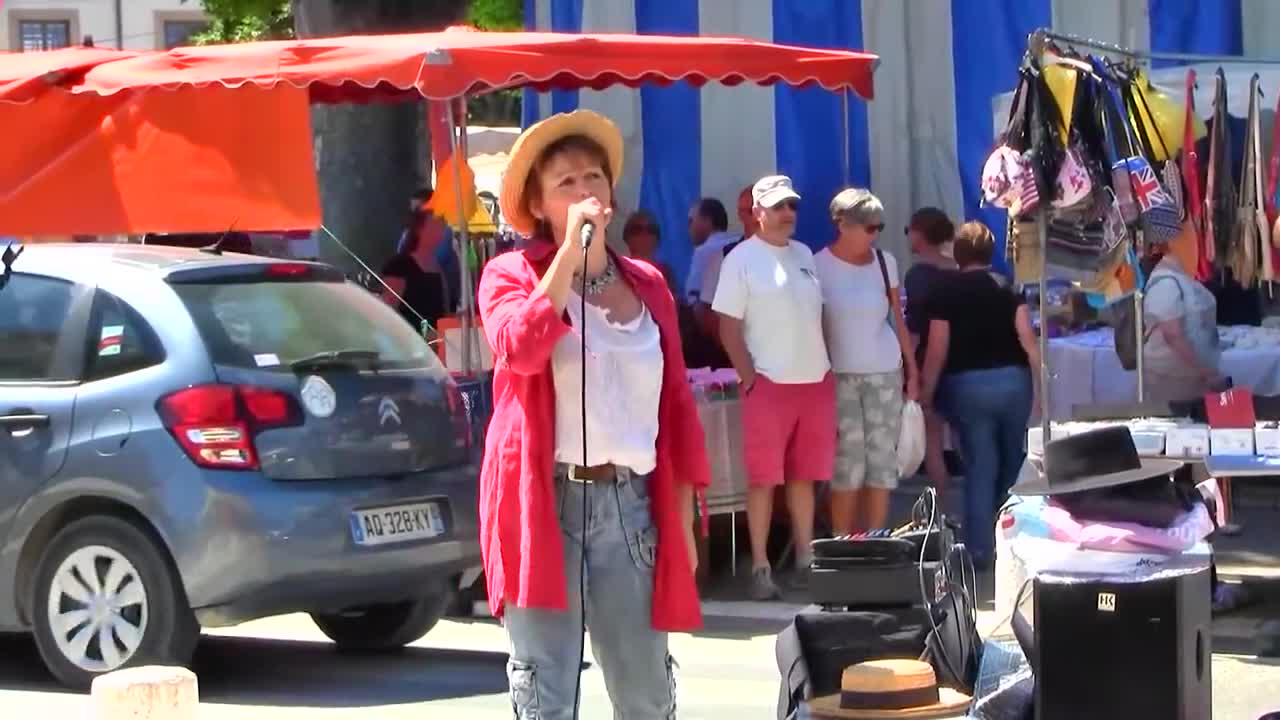 French Singer & Street Performer with music, St Remy, Provence, France