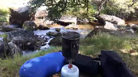 Boiling water to make a coffee. Riverside. Aug 2022