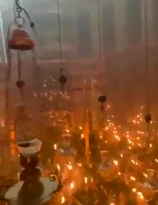 Holy fire at the Church of the Holy Sepulchre in Jerusalem.