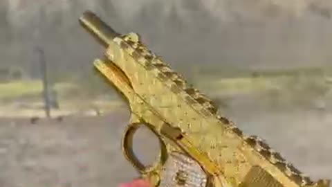 Gold gun