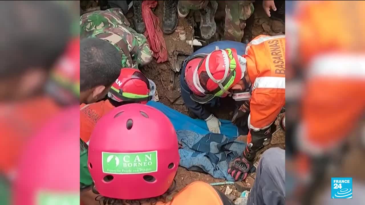 'Miracle' rescue of child trapped by Indonesia quake