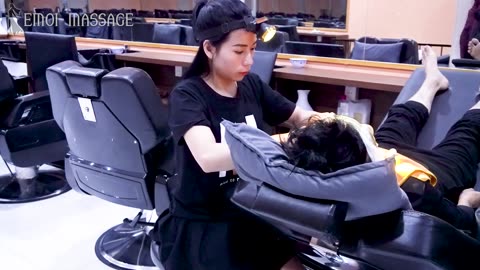 She stretches her shoulders with strength, relieving muscle pain
