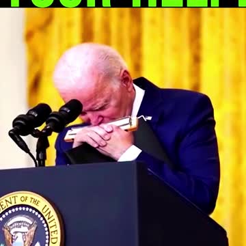 President Joe Biden plays the harmonica for the Fake News media and then is taken hostage