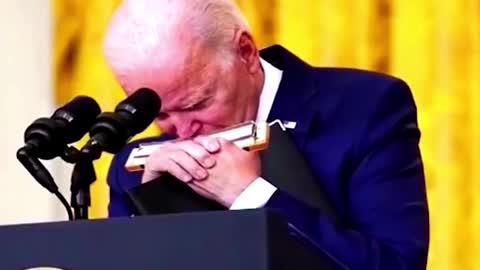 President Joe Biden plays the harmonica for the Fake News media and then is taken hostage