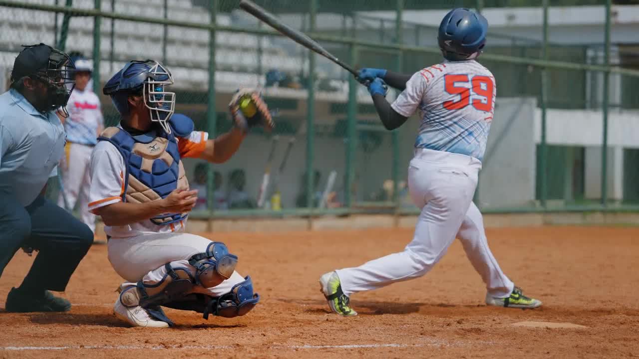 Medium Shot of Softball Player Catching the Ball