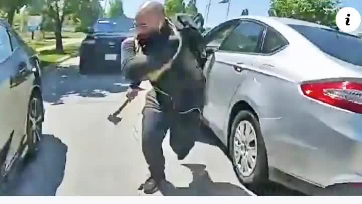 Car randomly pulls up next to a cop, driver jumps out with an axe