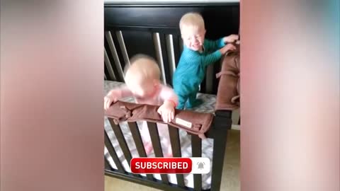twin babies playing together (very funny)