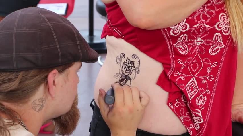 Getting a body painting on the Las Vegas strip.