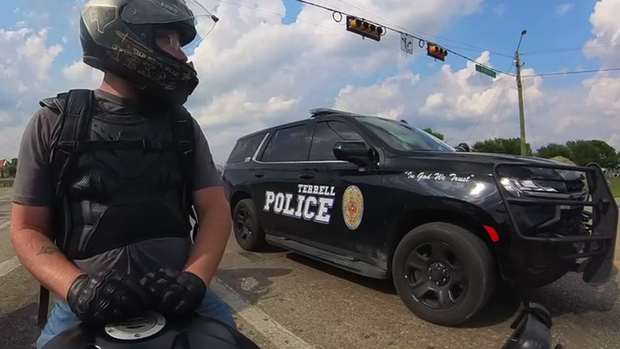 Cop Revs Engines With Motorcyclist