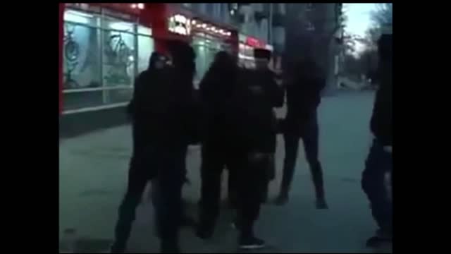 Ukraine 2014: Pravy Sector far-right group hunts and attacks Russians public.