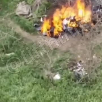 Drone Drops an Incendiary Munition on a Ukrainian Position