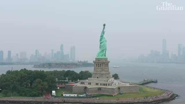 Aerial shots of New York show hazy skies from western US wildfires