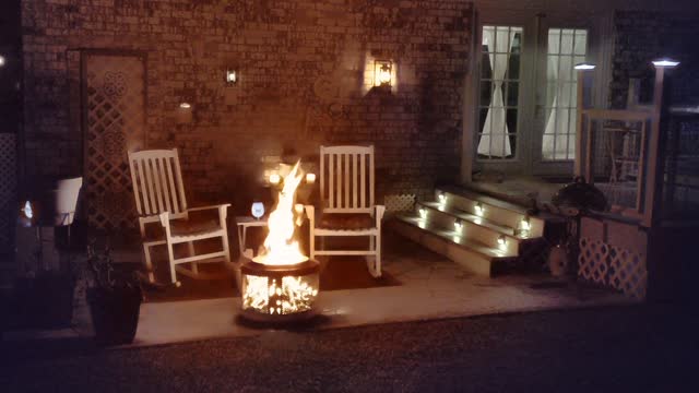 Relaxing by our DIY washing machine tub fire pit.