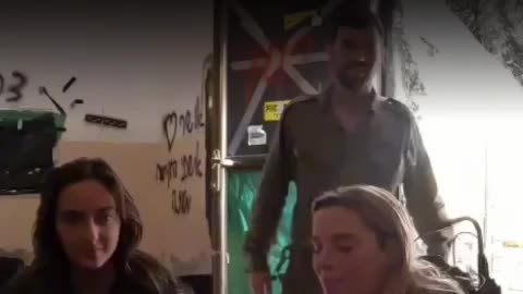 IDF female commander singing while taking a break from fighting Hamas in