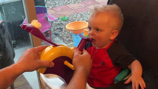 Funny baby tries the Pie Face game