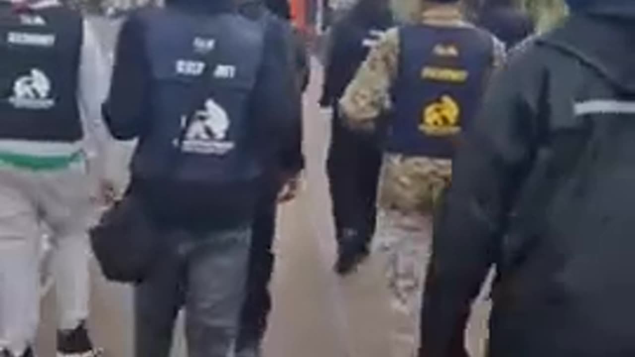 African Migrants roam UK Streets in Bulletproof Vests and Military Fatigues