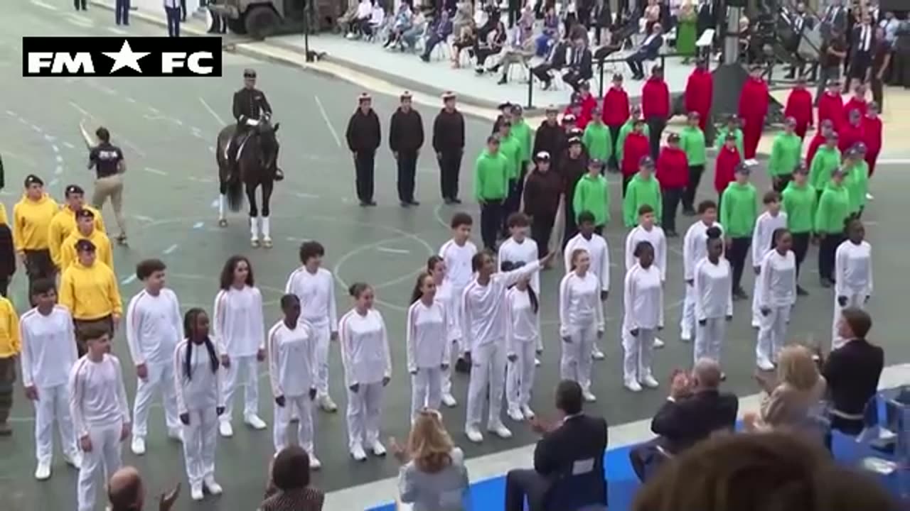 France celebrates Bastille Day with parade featuring Olympic torch