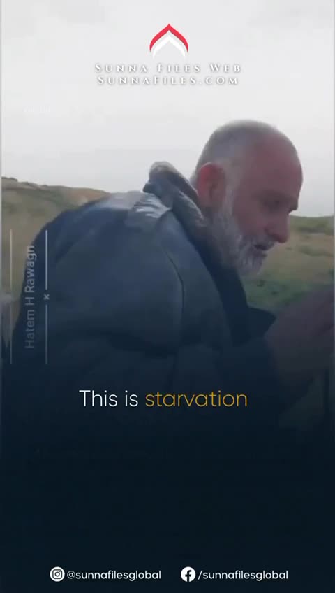 Palestinian woman breaks down after receiving bread