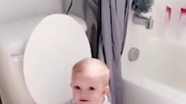 baby in the toilet