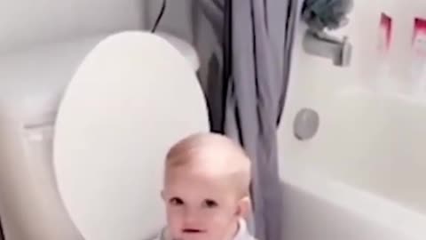 baby in the toilet