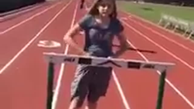 Collab copyright protection - girl in grey over hurdle faceplant