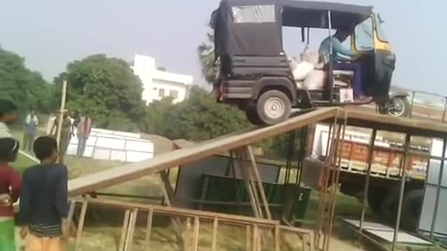 Amazing stunt with auto rickshaw in village