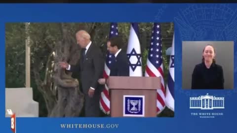 Joe biden tries to shake hands with nobody