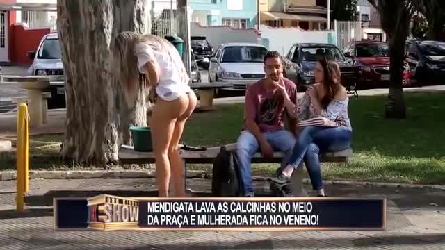 Hottie takes off her clothes to wash them on the street and causes a fuss