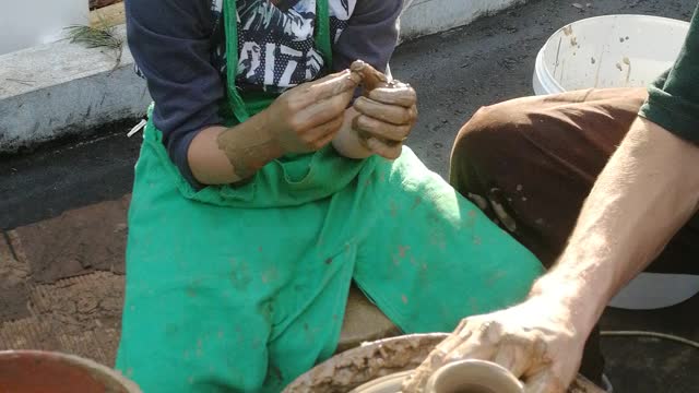 Pottery. Learning to make a jug.