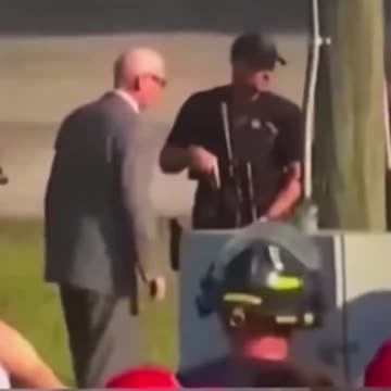 Grey Suit Man - Butler Rally