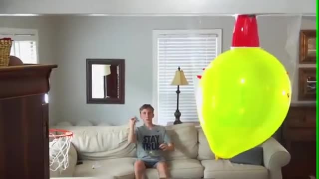 The GREATEST Balloon Popping Trick Shot of ALL TIME!! (That's Amazing)